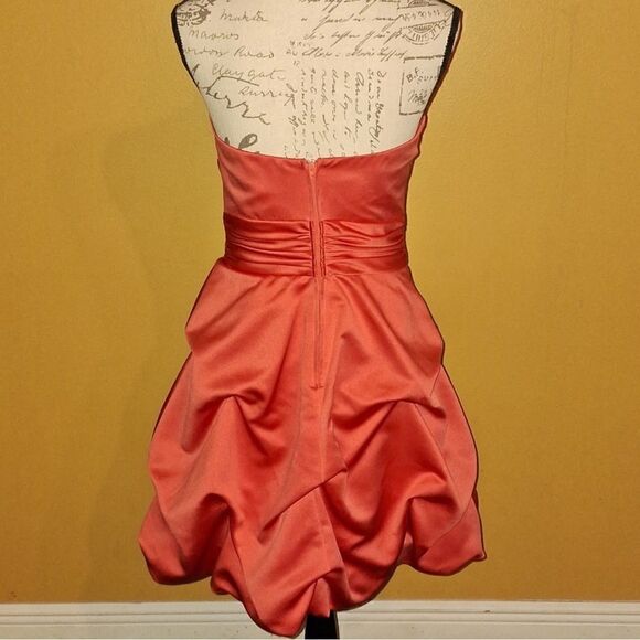 Stunning Coral Strapless Ruffled Puffy Dress by David's Bridal - Picture 2 of 5